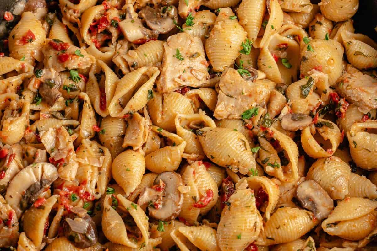 up close image of creamy tuscan chicken pasta