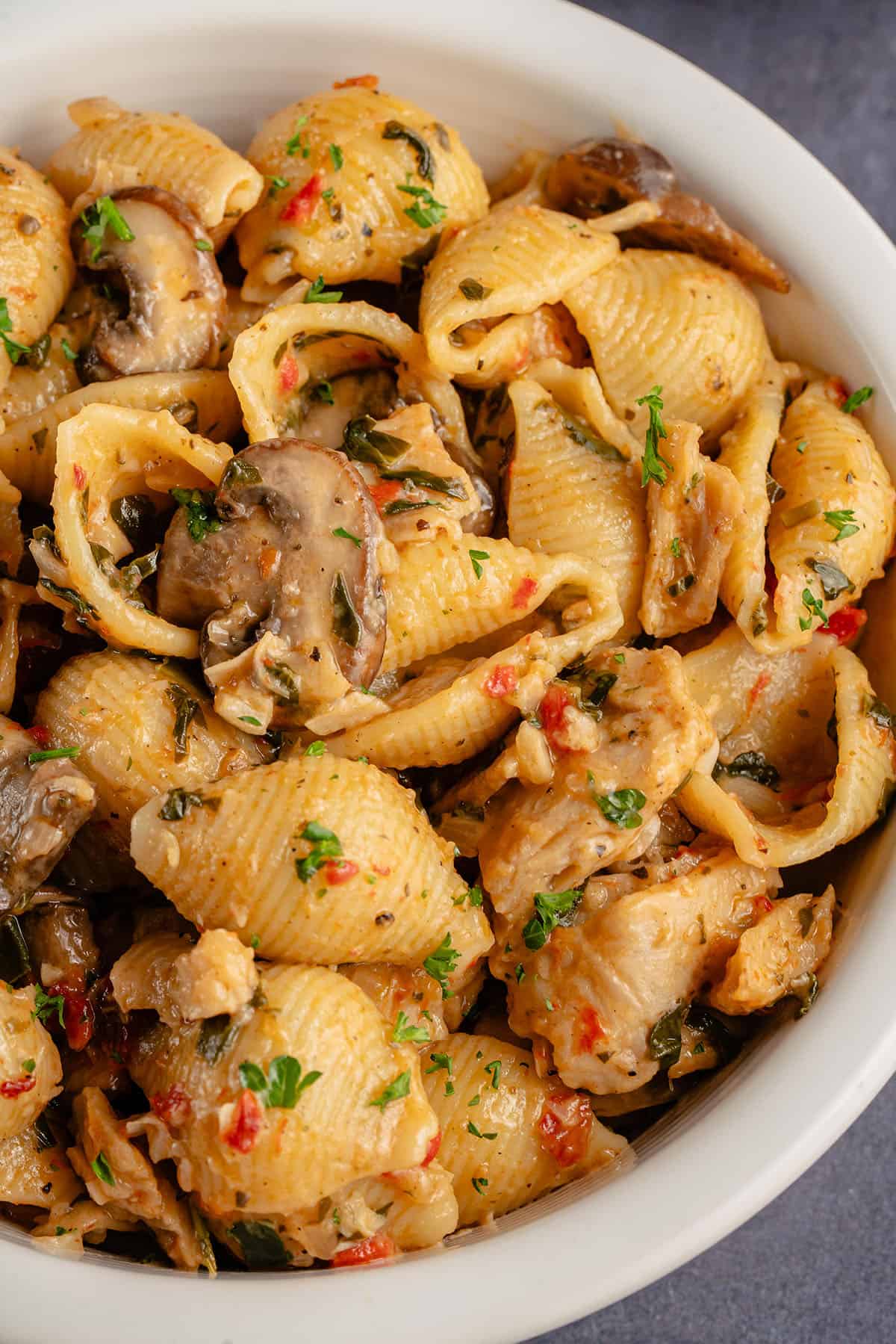up close image of a bowl of tuscan chicken pasta