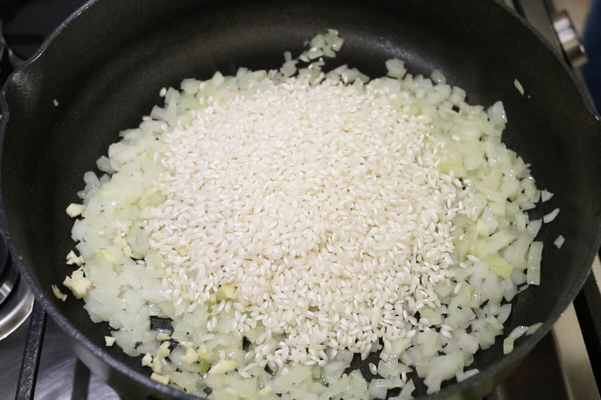 rice being added to the pan