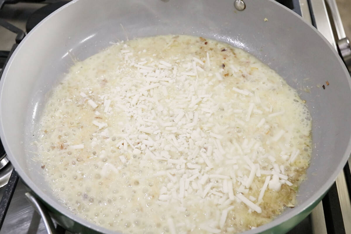 step by step: adding non-dairy cheese to a pan