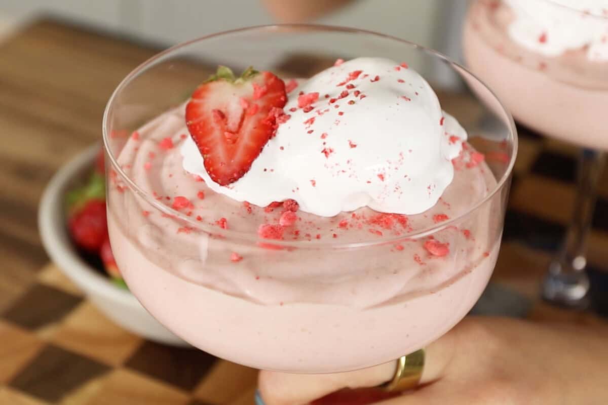 horizontal photo of vegan strawberry mousse in glass serving cup