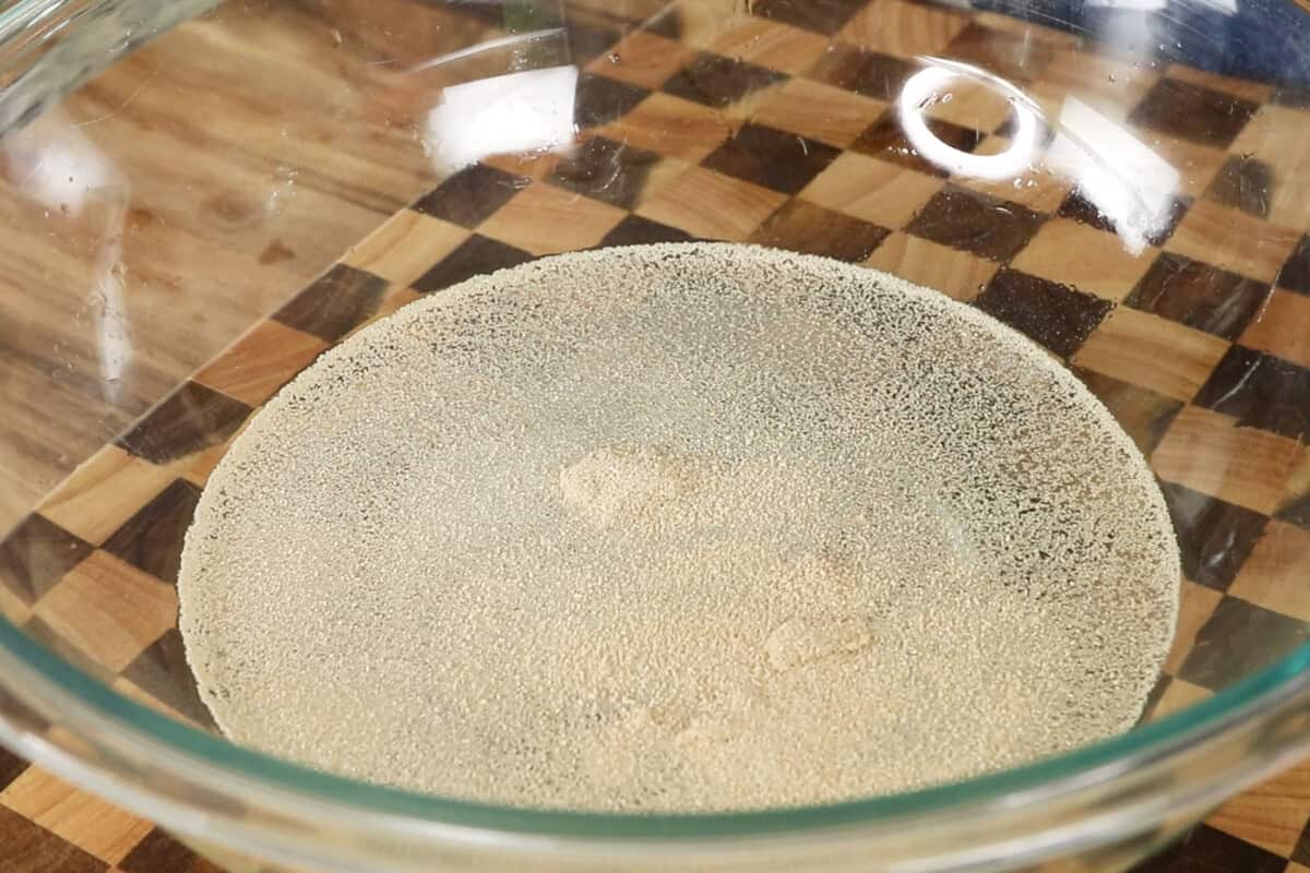 step by step - adding yeast to the bowl