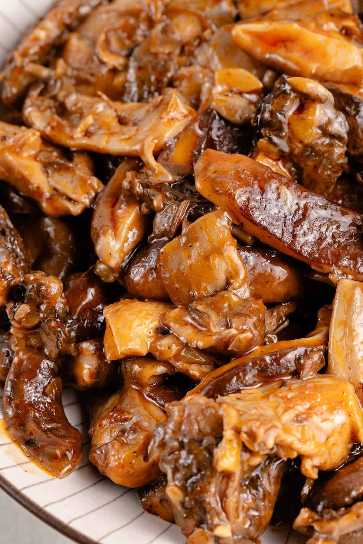 close up of saucy buffalo mushrooms