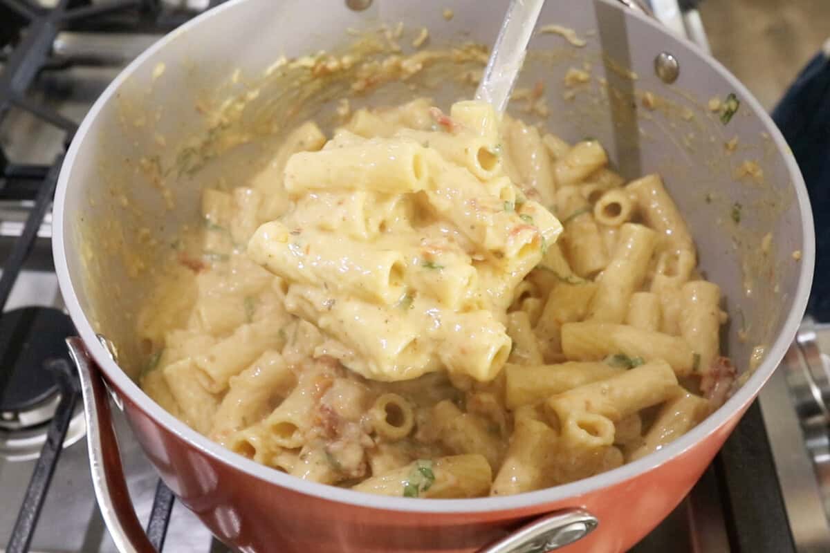 finished marry me pasta being scooped out of the pot