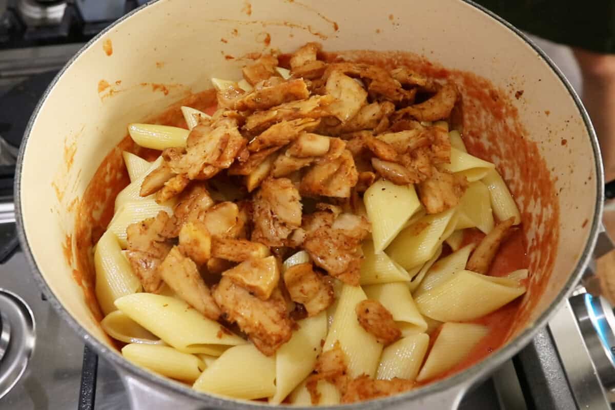 how to make creamy vegan cajun pasta with vegan chicken in Dutch oven