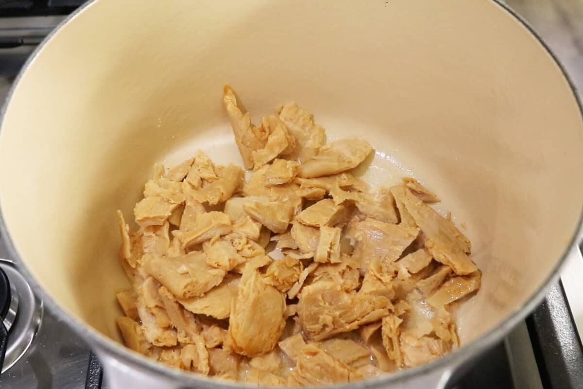 sautéing vegan chicken in vegan butter in large Dutch oven