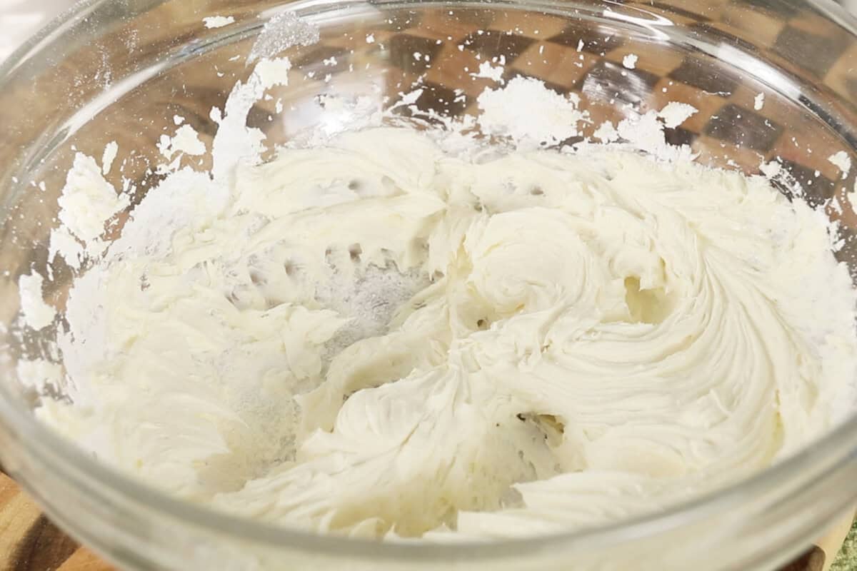 mixing the butter and powdered sugar together