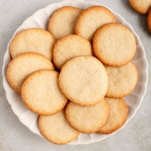 vegan vanilla wafers piled on a white plate