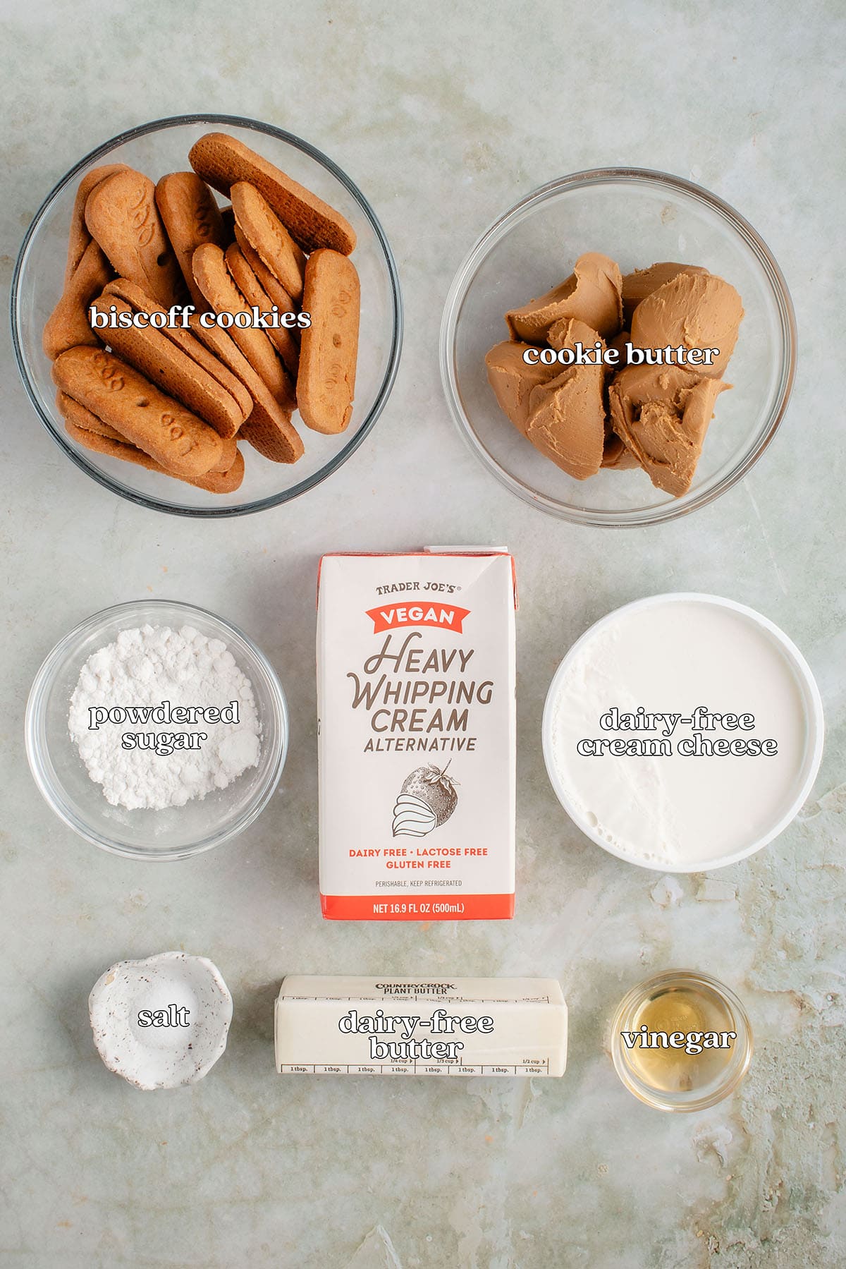 biscoff cookies, cookie butter, powdered sugar, vegan heavy whipping cream alternative, dairy-free cream cheese, salt, dairy-free butter, vinegar