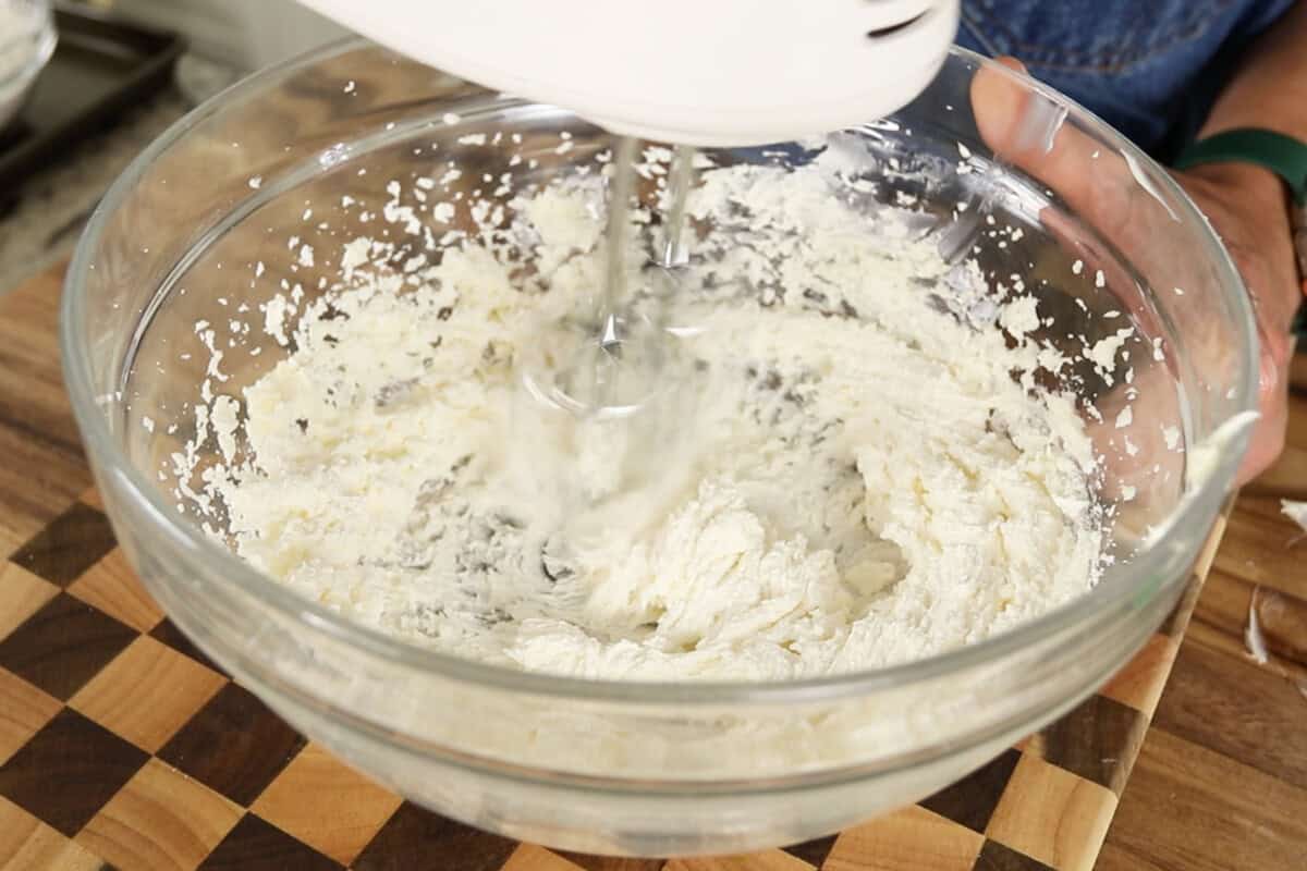 step by step: fully combined butter and sugar with hand mixer