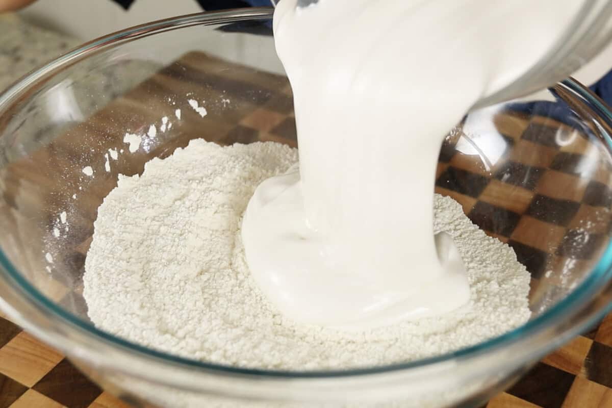 step by step: adding the whipped aquafaba to the flour