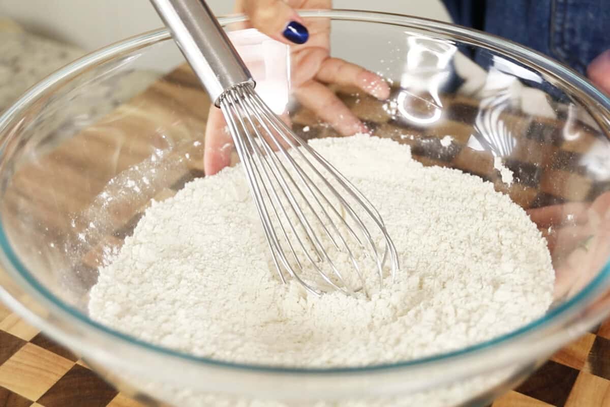 step by step: whisking flour in bowl