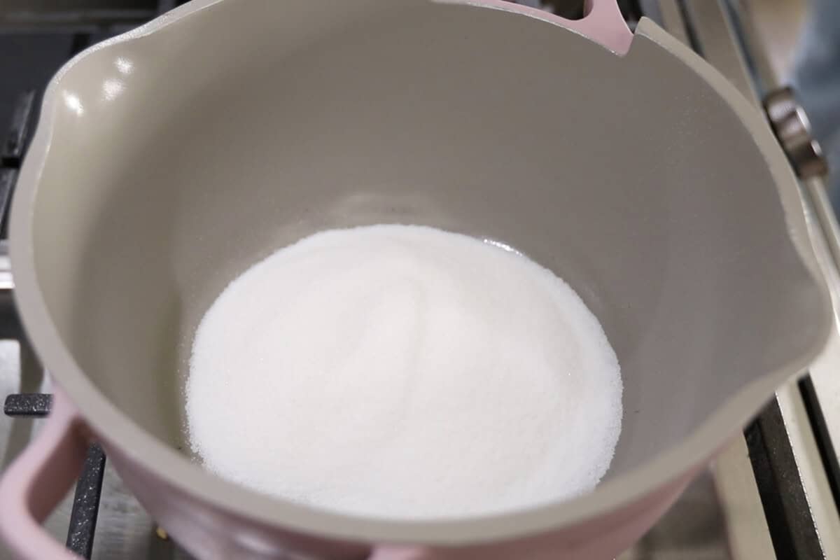 preparing vegan vanilla custard in a small pan