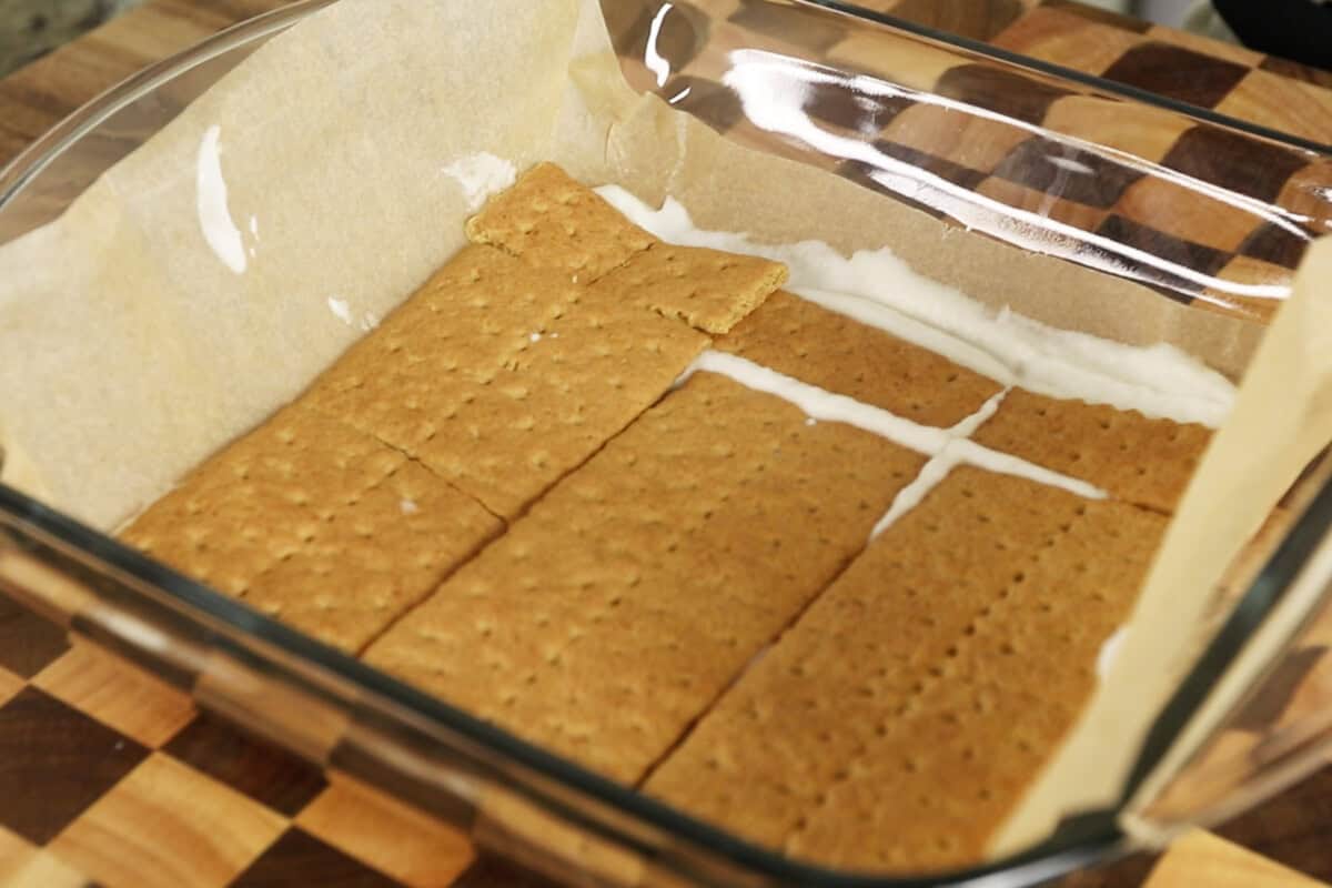 adding more graham crackers