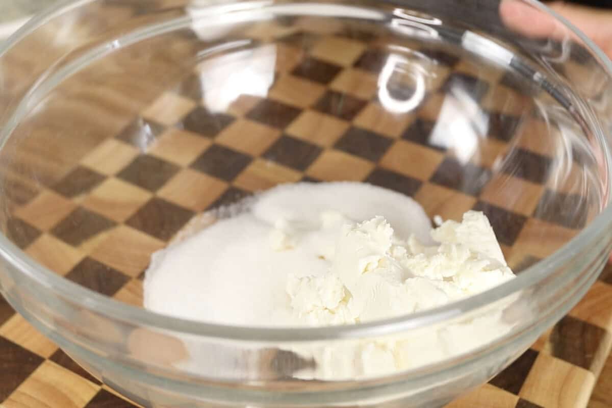 step by step: adding cream cheese to the bowl