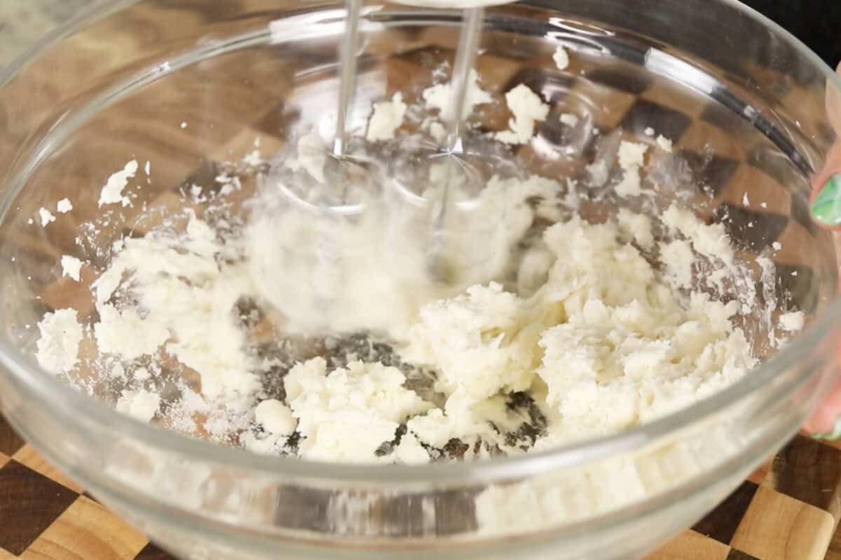 step by step: creaming together cream cheese and sugar