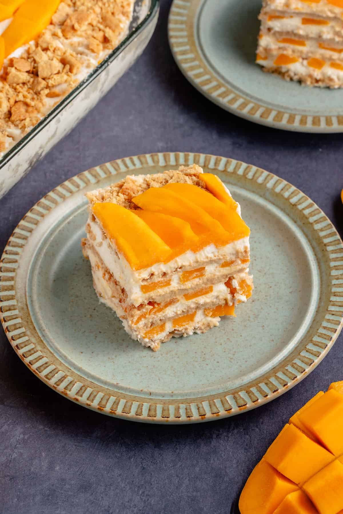 slice of mango float on a blue plate