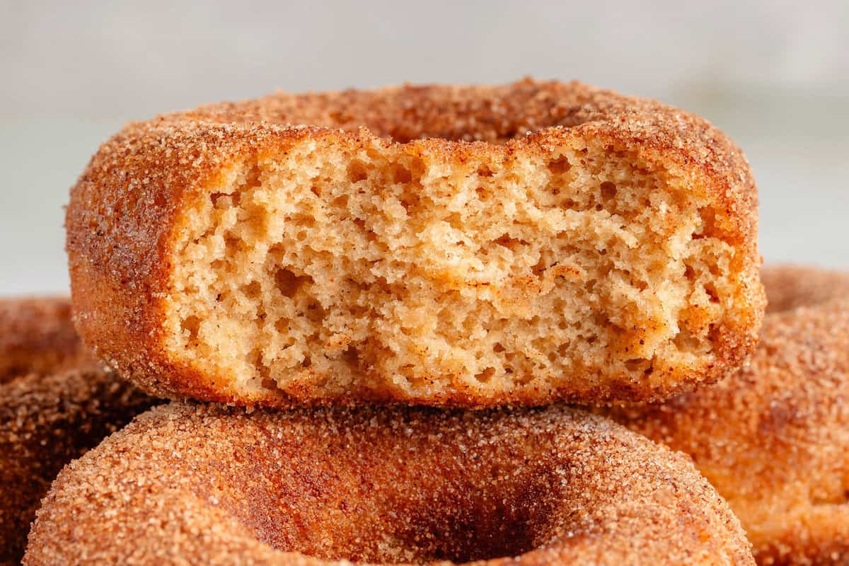 close up photo of the inside of baked apple cider donuts