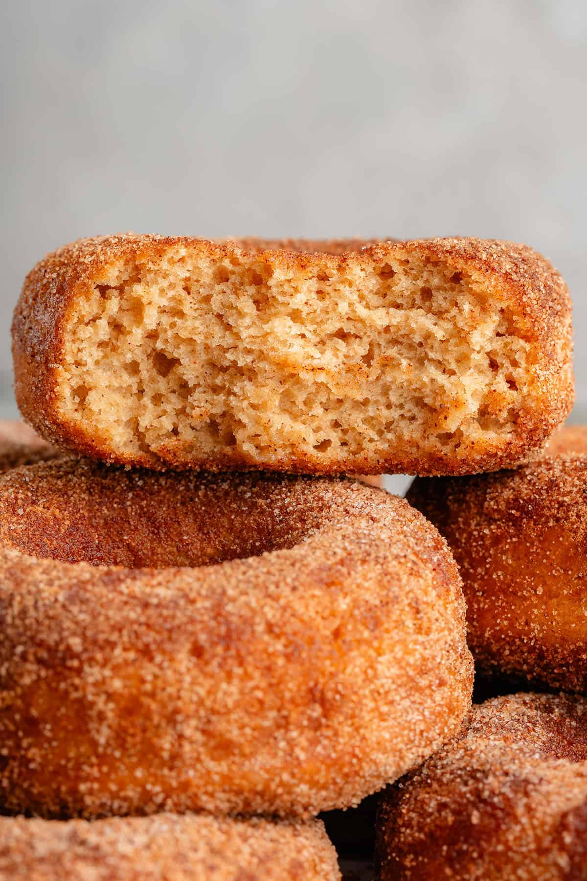 close up photo of the inside of baked apple cider donuts