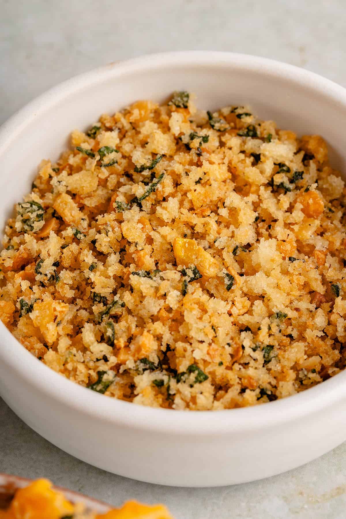 toasted garlic and sage breadcrumbs in white bowl