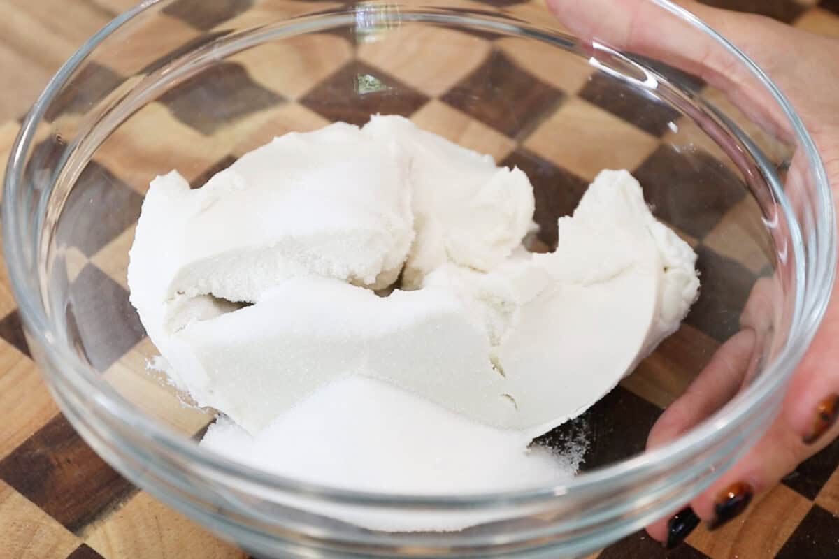 vegan cream cheese and sugar in glass bowl