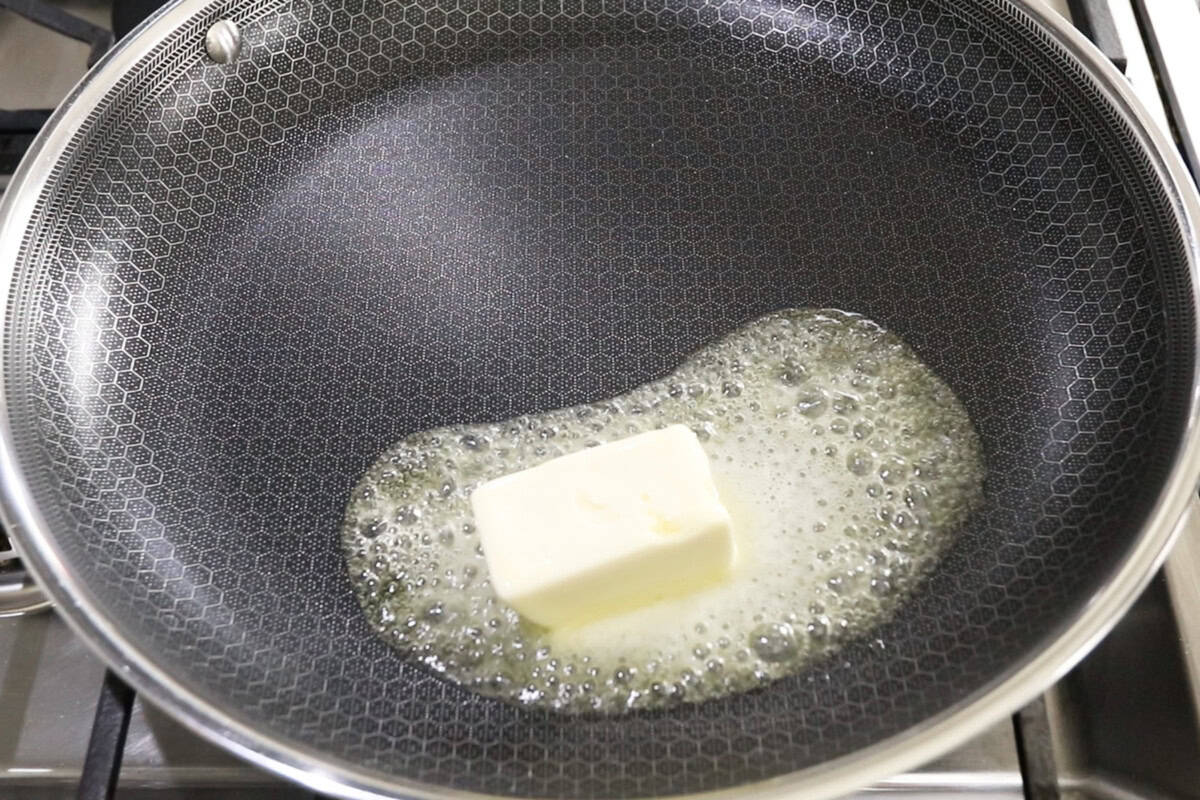 melting dairy-free butter in large skillet