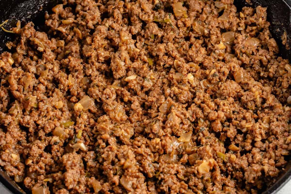 cast iron skillet filled with vegan ground beef taco meat