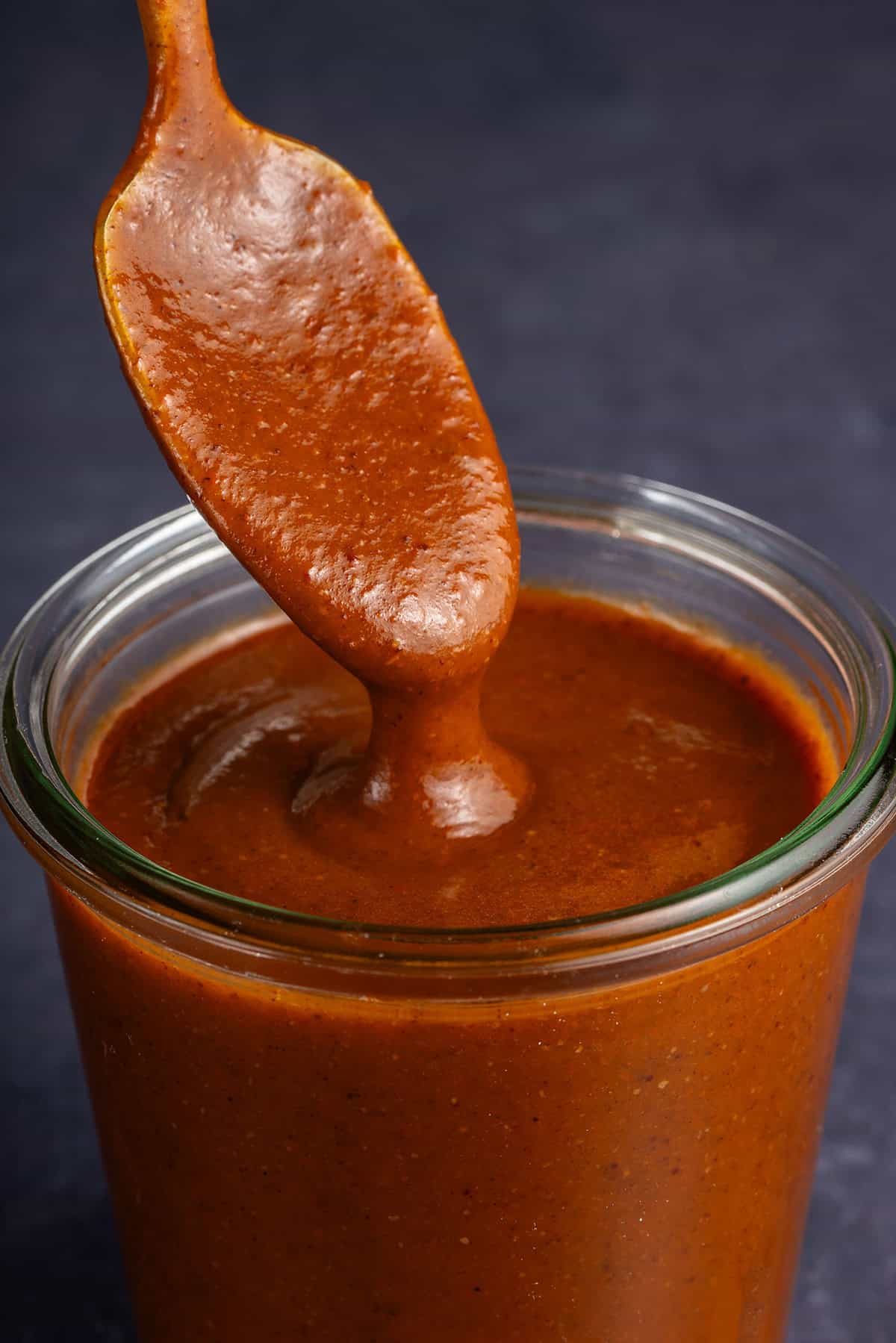 spoon of enchilada sauce