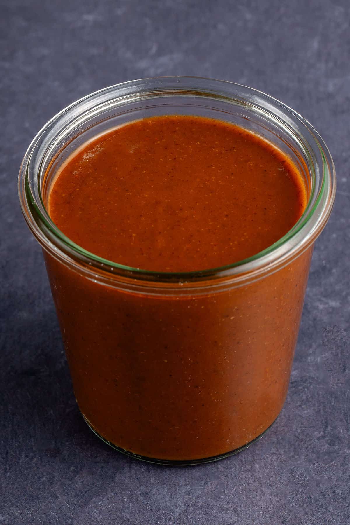 enchilada sauce in a glass jar