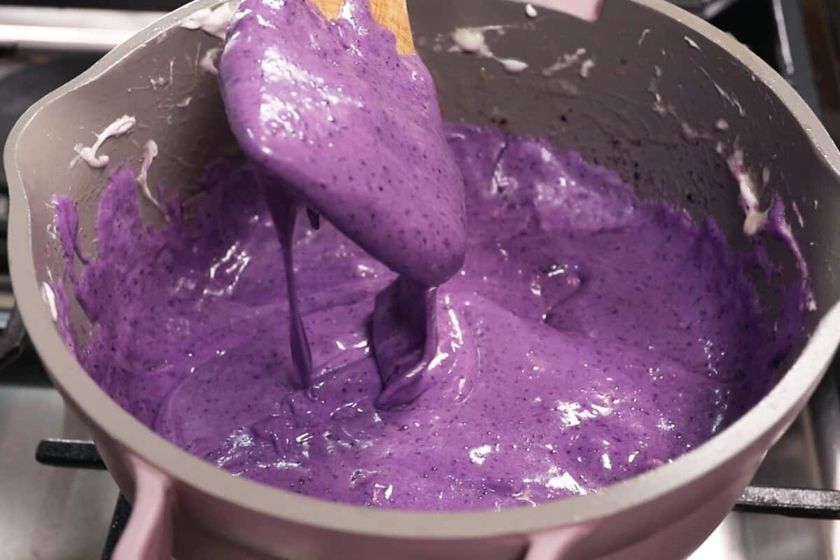 mixed ube marshmallow mixture in a pot