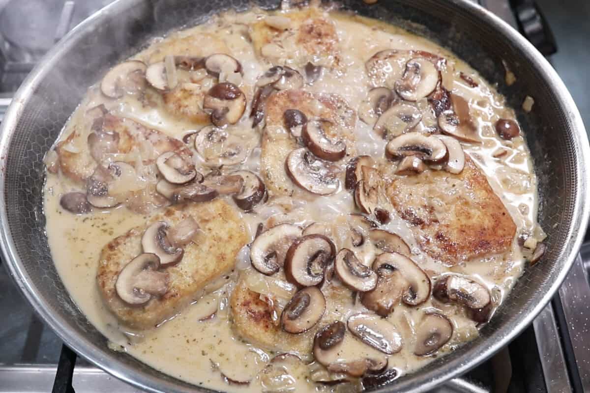 letting the tofu cook in the creamy sherry mixture