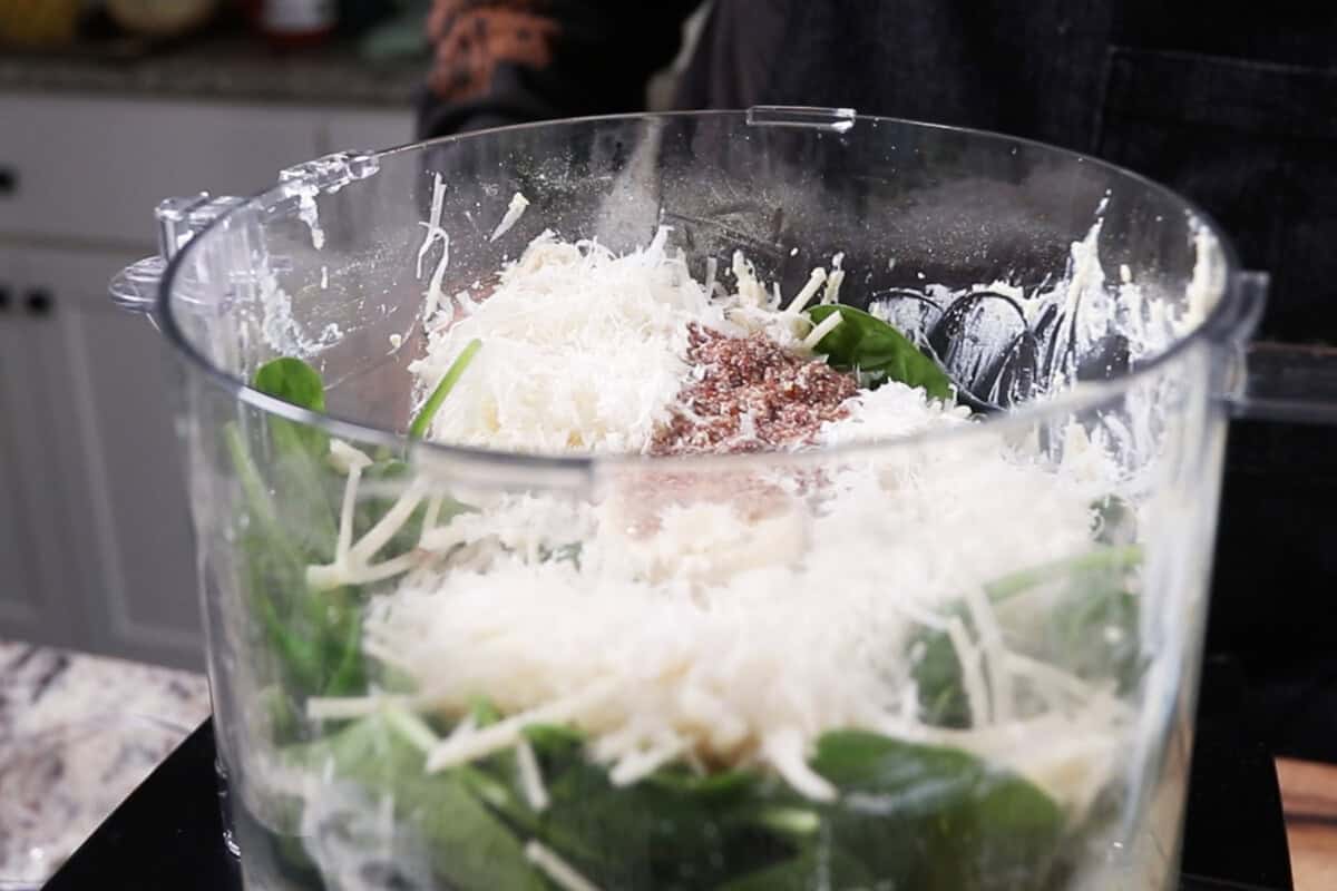 adding the remainder of filling ingredients to the tofu ricotta in a food processor