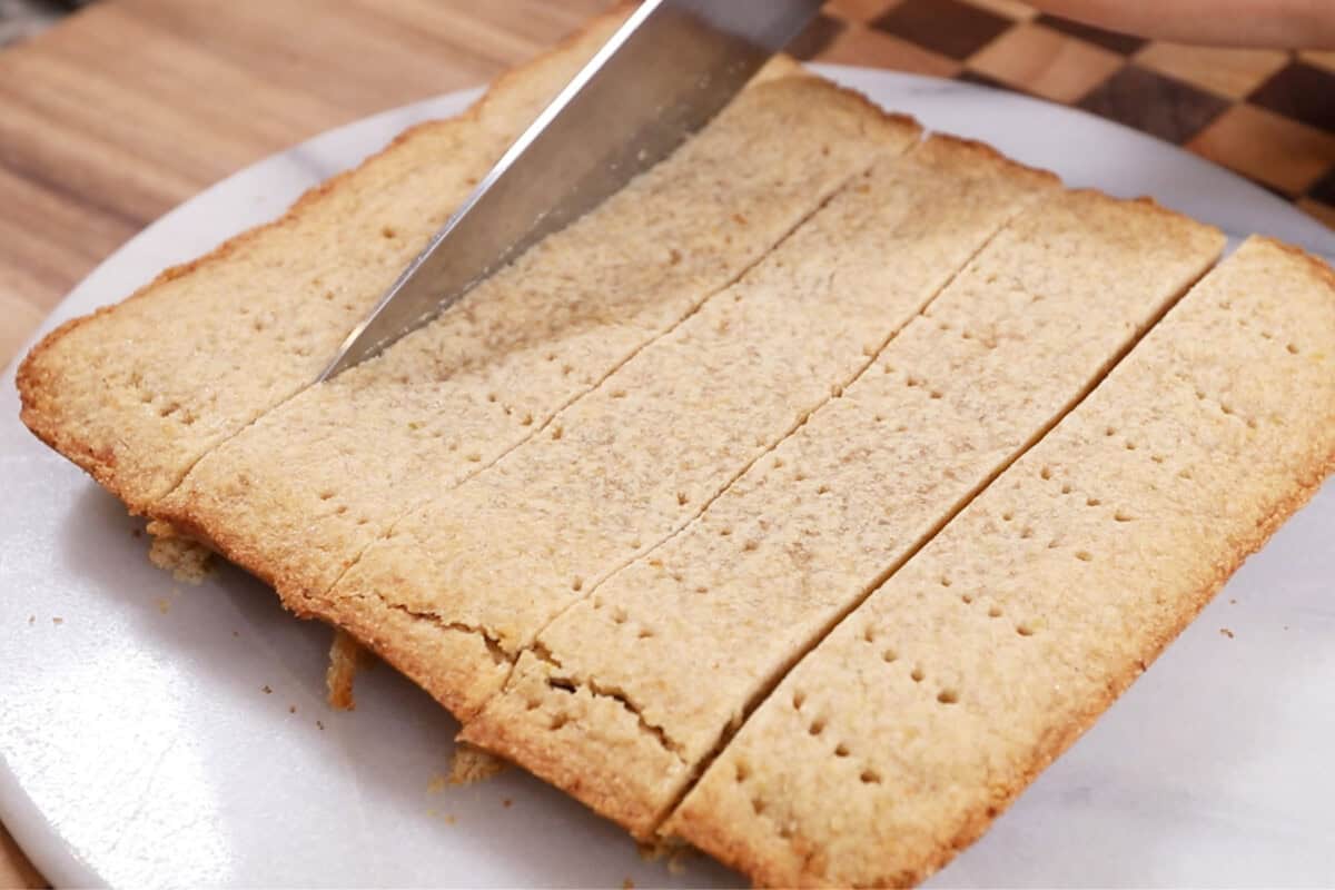 slicing the shortbread with a knife