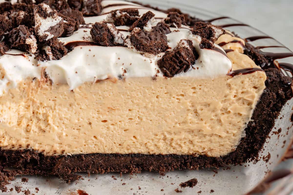 the inside of a slice of no baked oreo peanut butter pie