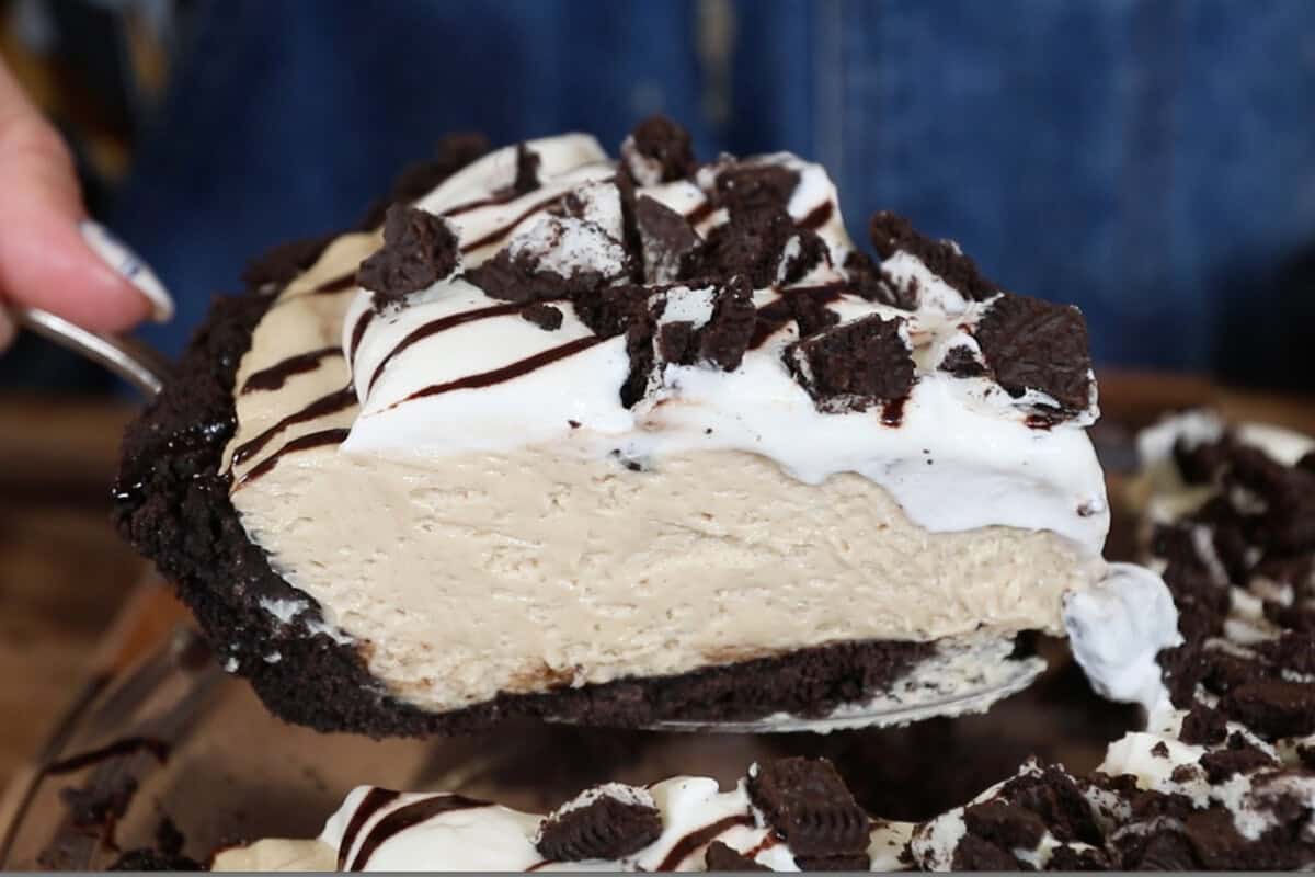 slice of peanut butter pie being lifted with spatula