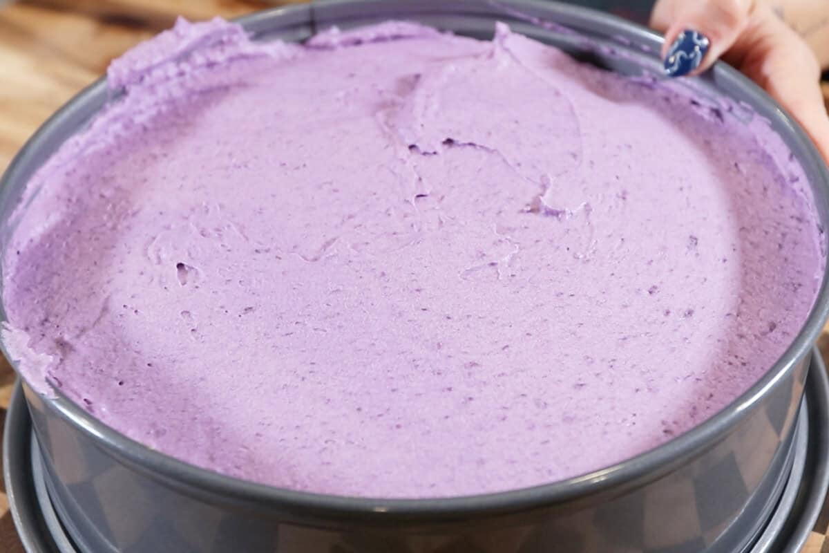 ube pie in a springform pan before setting