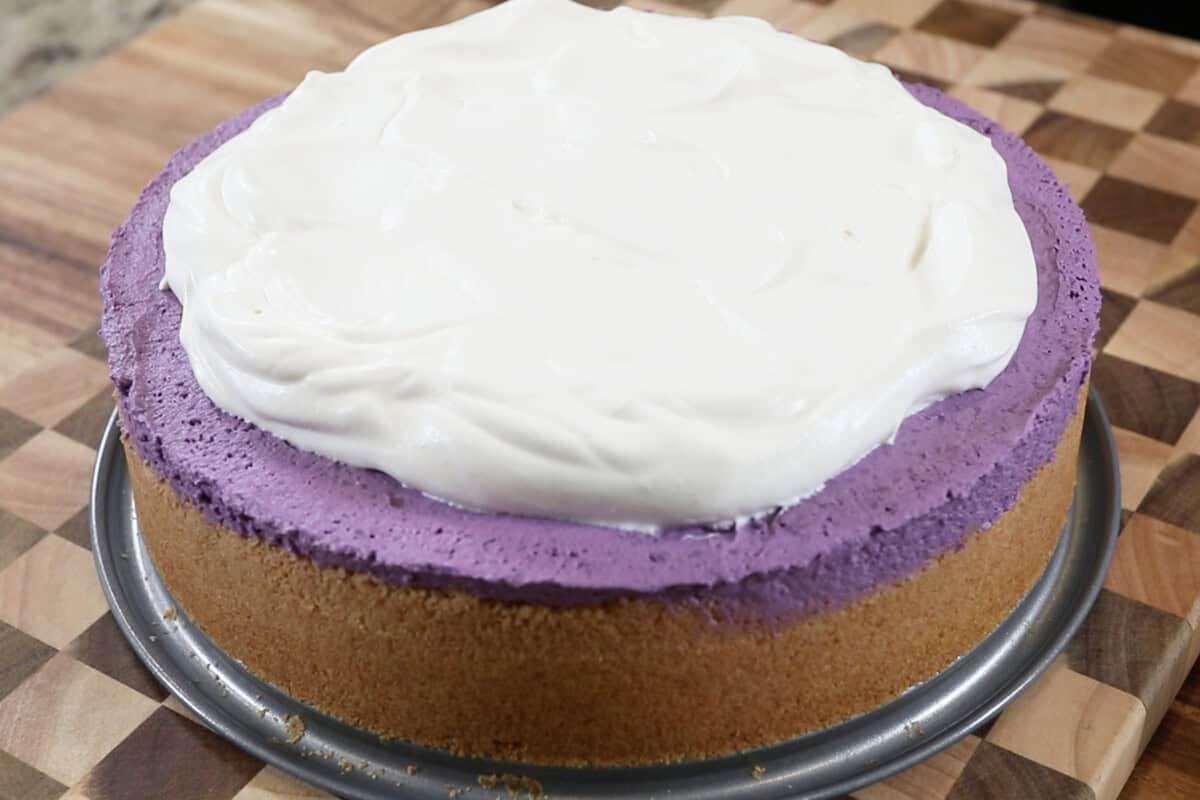 finished ube pie topped with whipped cream