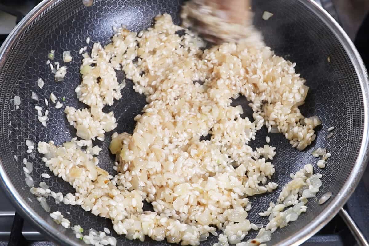 mixing rice in wok