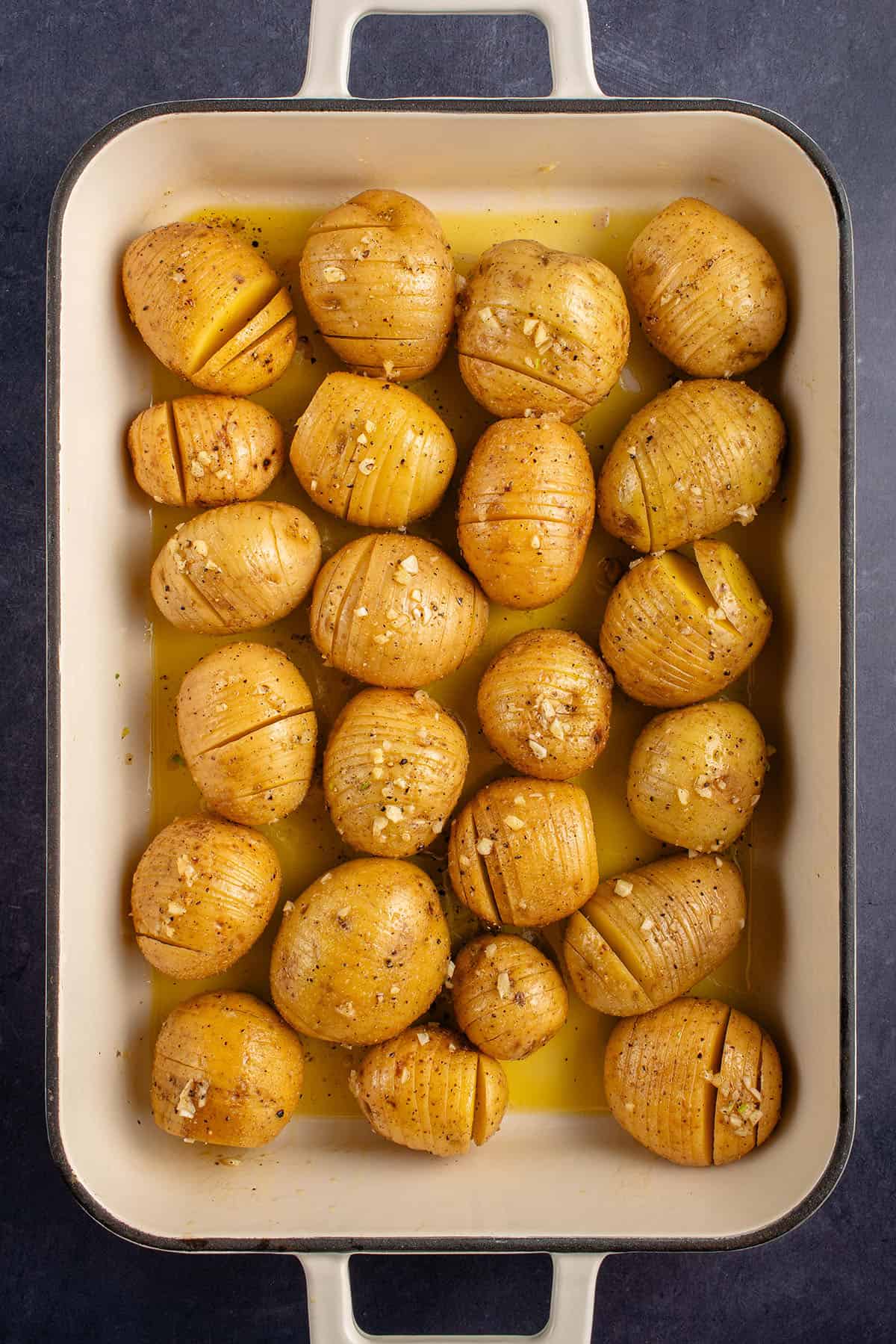 hasselback potatoes in dish before baking