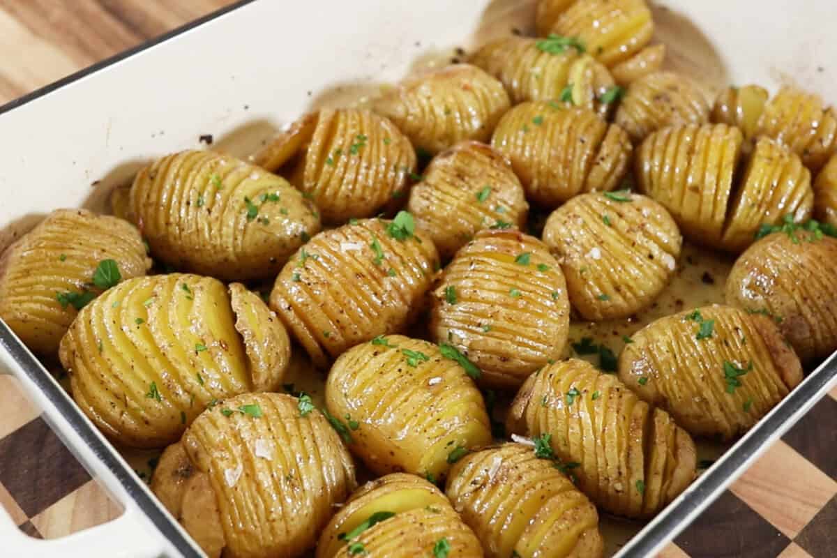 cooked hasselback potatoes in a baking dish