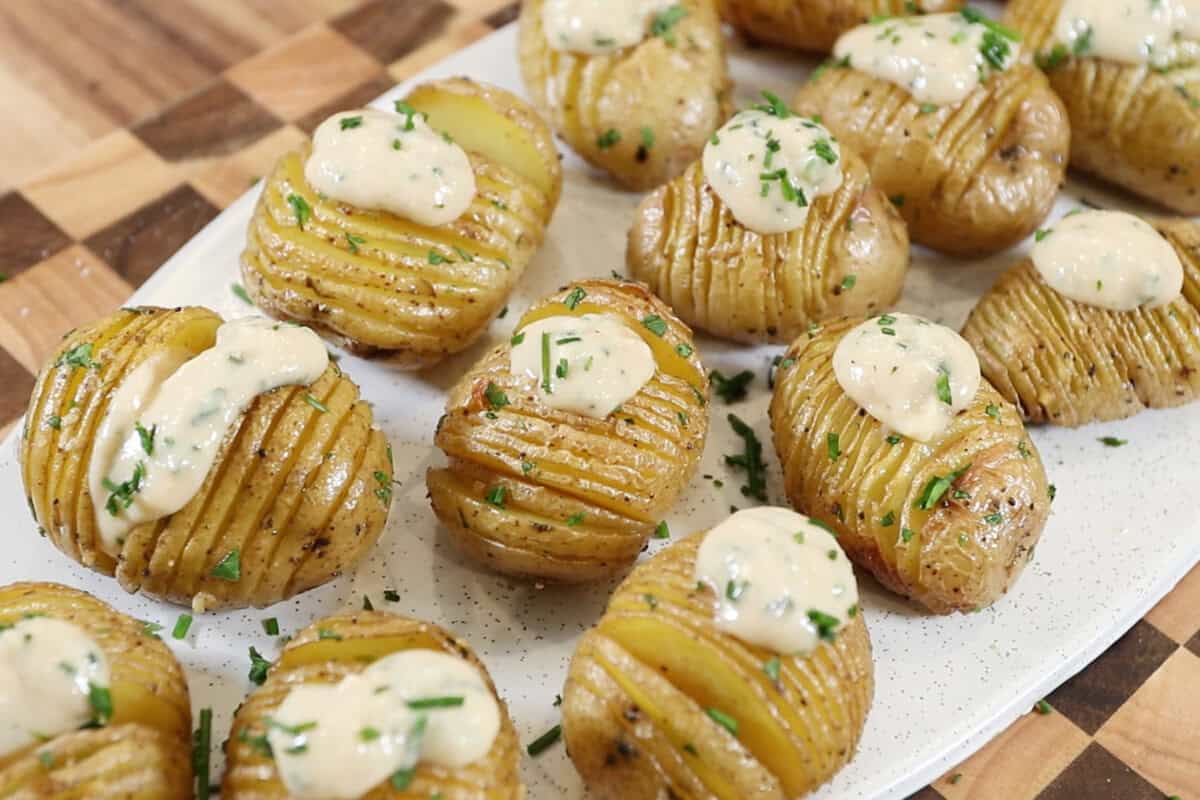 finished mini vegan sour cream and onion hasselback potatoes