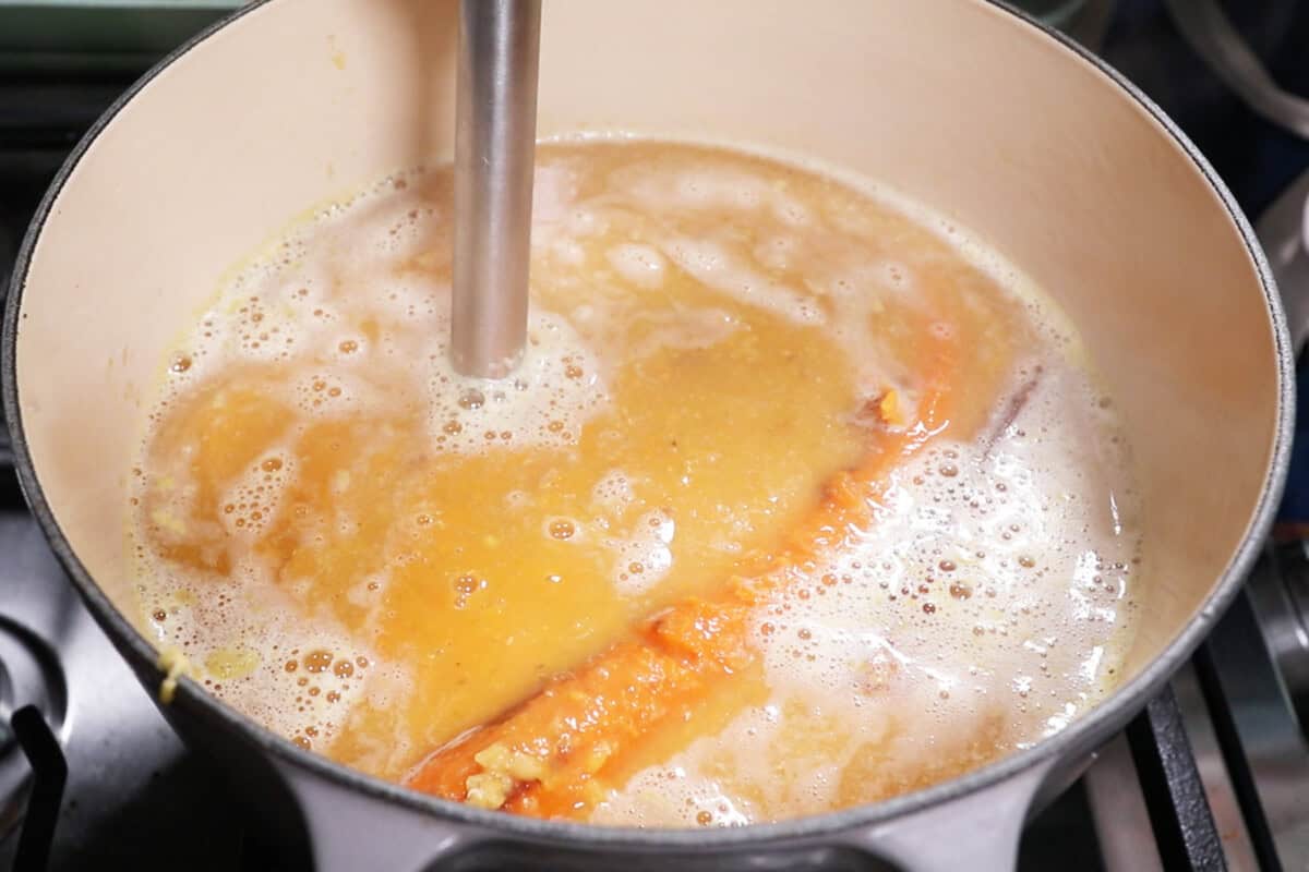 immersion blending soup until smooth