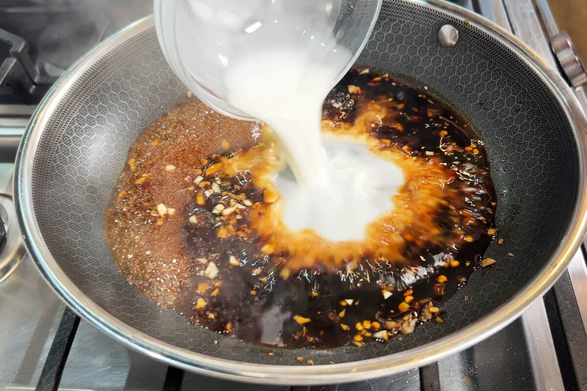 adding cornstarch slurry to pan