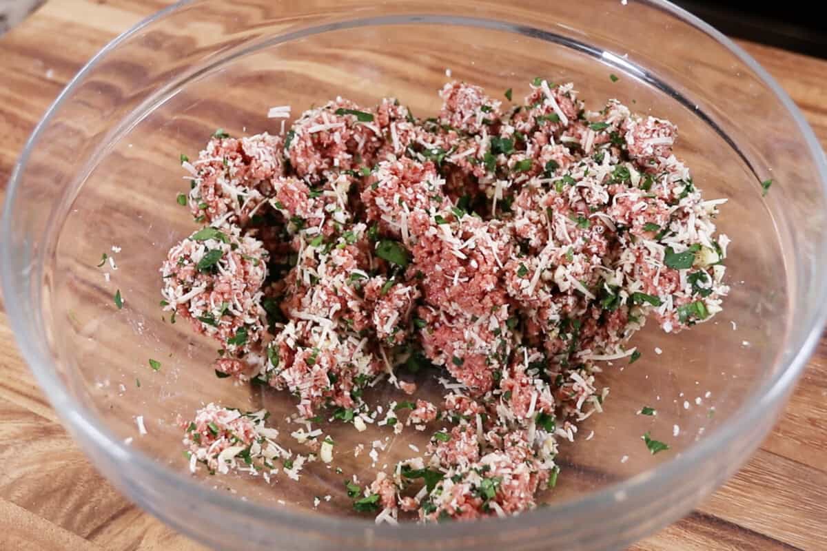 mixed meatball ingredients in bowl