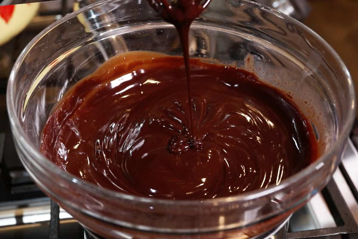 melted chocolate ganache in a bowl