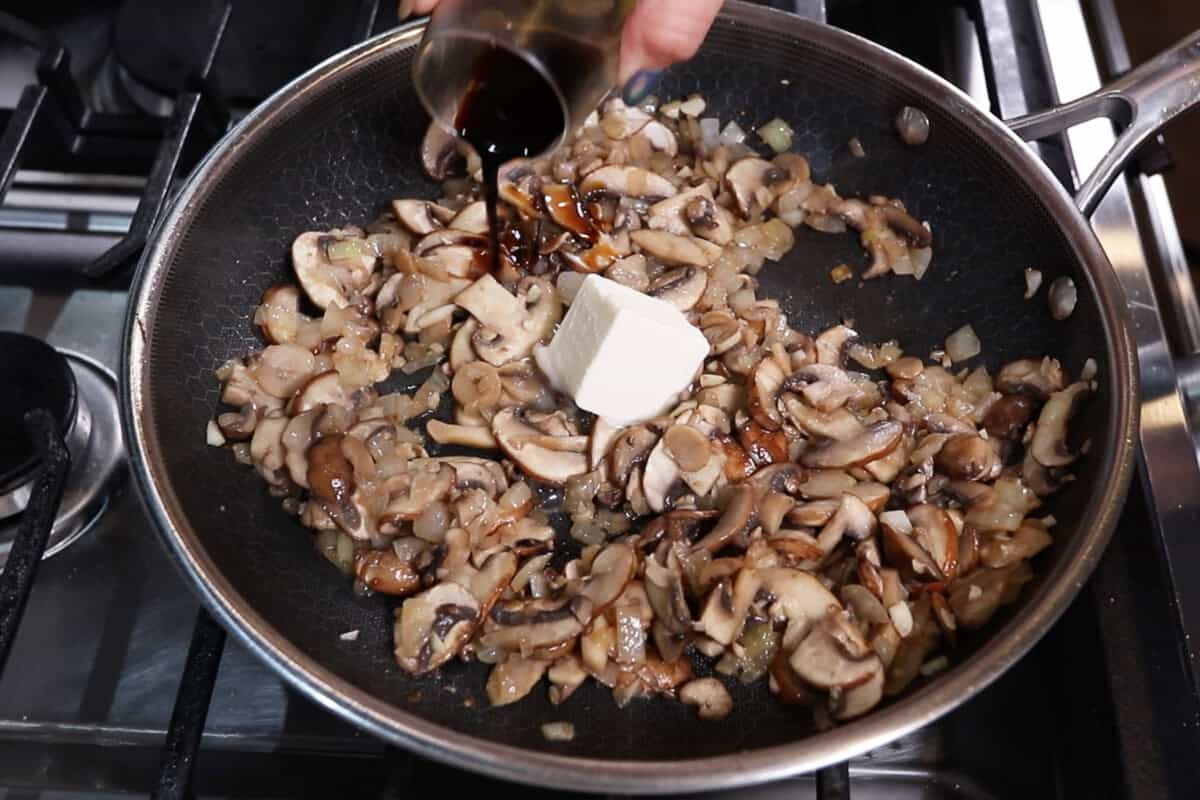 adding dairy-free butter and Worcestershire to the pan