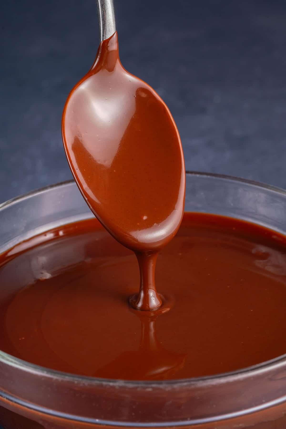 spoonful of dripping chocolate ganache