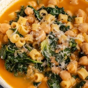 bowl of pasta e ceci topped with parm