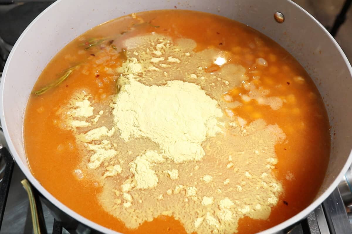 adding nutritional yeast to the dutch oven