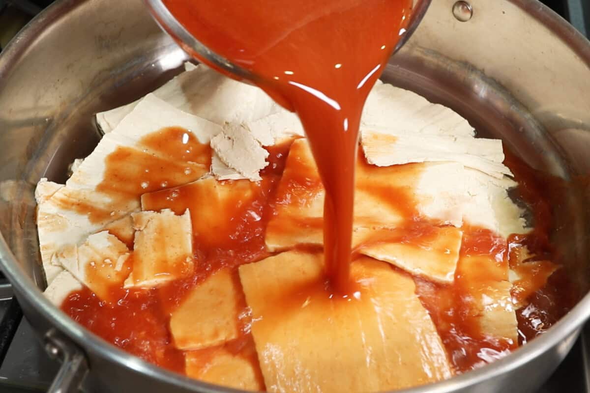 thinly sliced tofu sheets and marinade for Ham-Style Tofu Deli Meat Slices in large pot